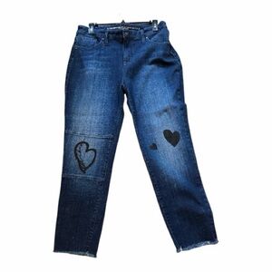 Chicos So Slimming Jean with Black Hearts fits like size 10P. 1.5P chicos size